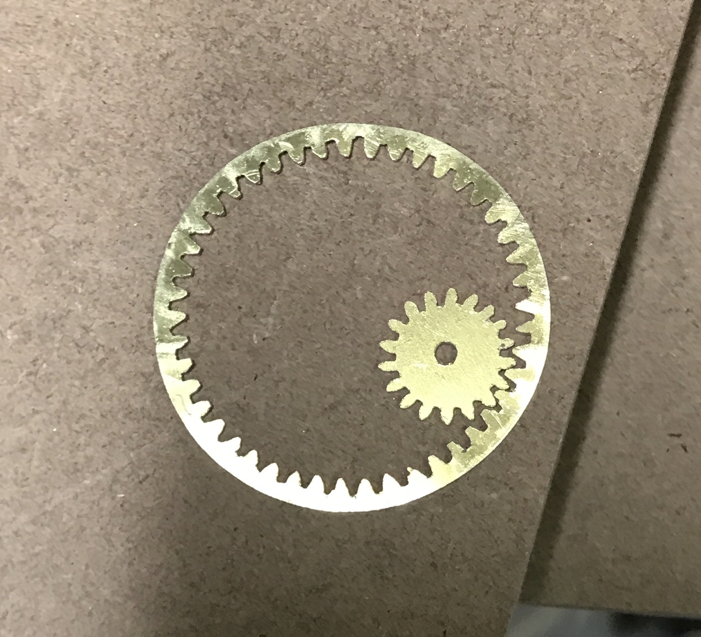 The large gear and central gear meshed